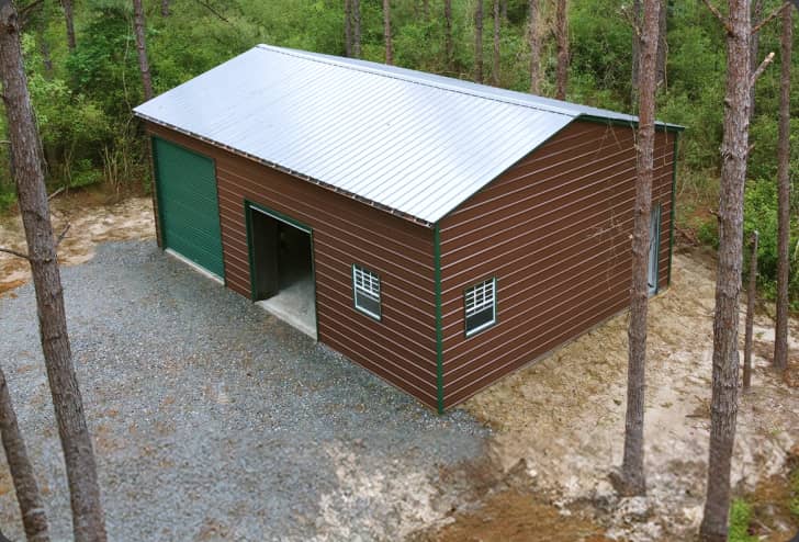 Brown Metal Building with Green Trim