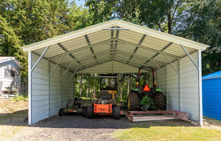 Vertical metal carport with silver car parked inside