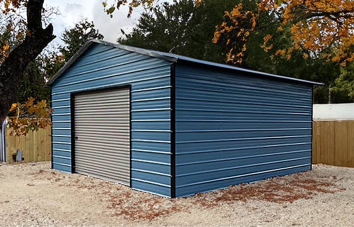 Red boxed-eave style roof metal garage with single overhead door and walk-in door