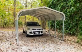 One car carport in the woods