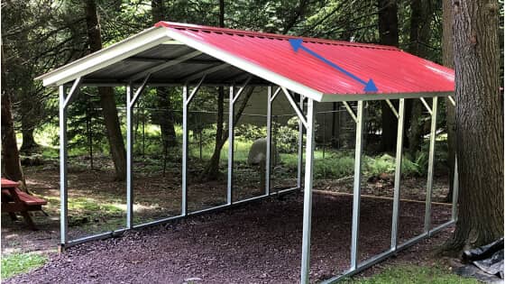 A red carport with a vertical-style roof