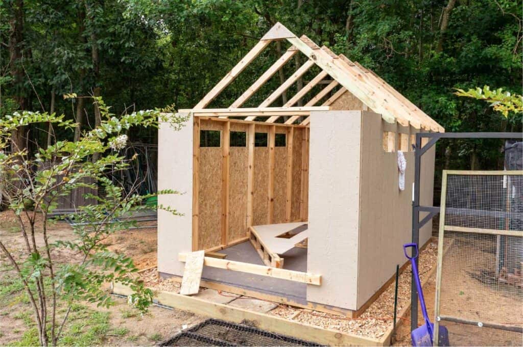 An image on a structure being built after securing a shed permit.