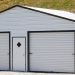 metal garage with two garage doors, a walk-in door, and black trim