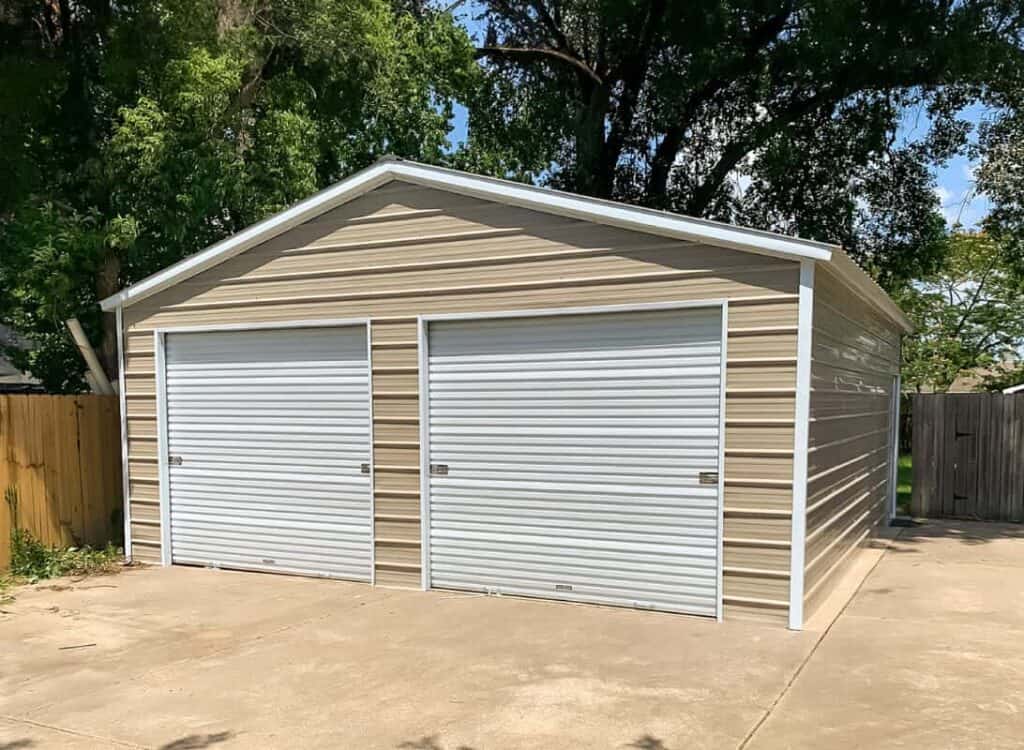 detached two-car metal garage on driveway
