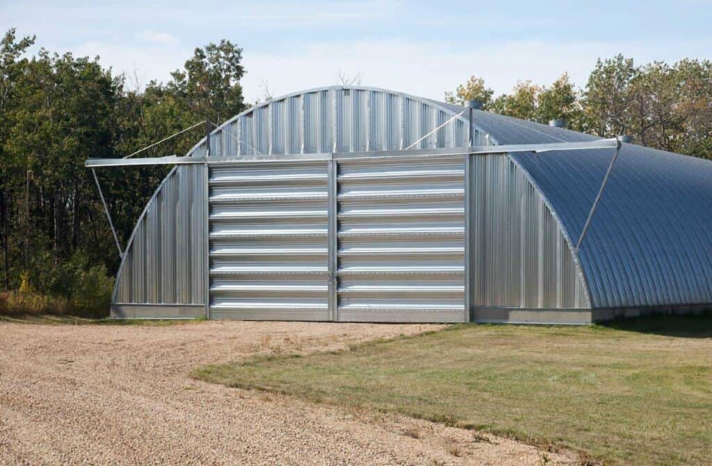 large metal quonset hut with double doors