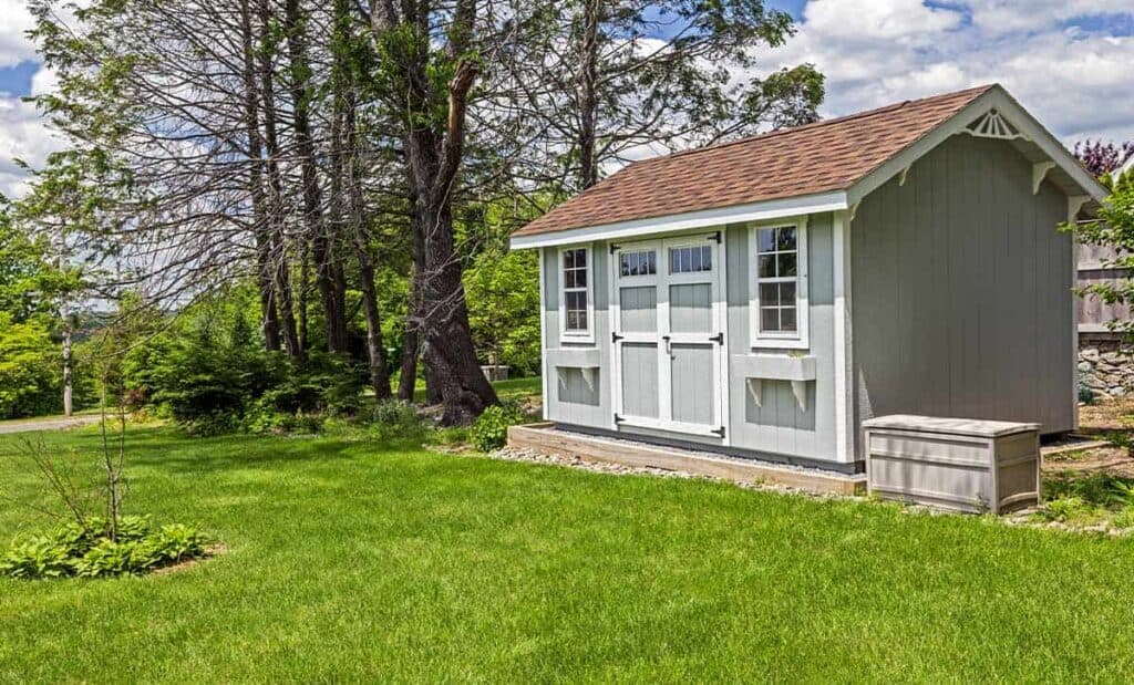 backyard wooden shed with a-frame roof