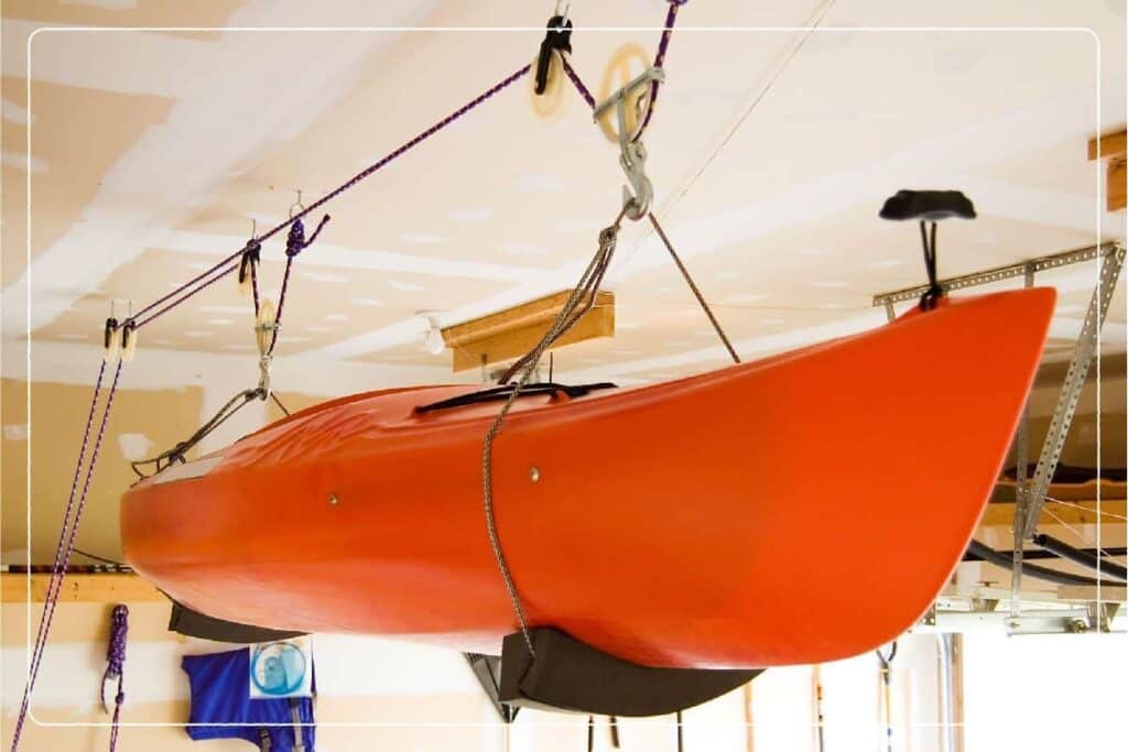 kayak hanging in garage overhead space