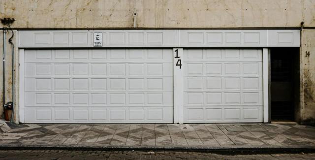 Closed double garage doors on a residential garage exterior
