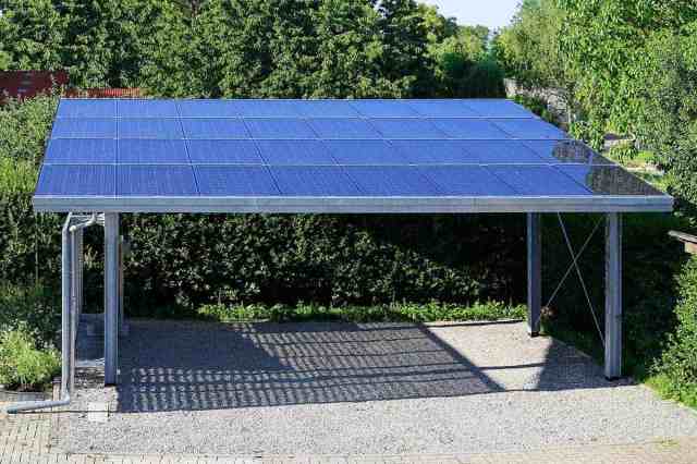 carport with solar panels on the roof