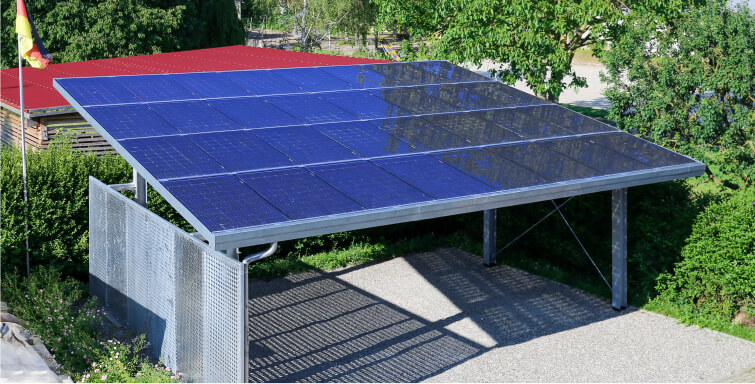 Solar carport with a large array of solar panels, providing shade and energy production.