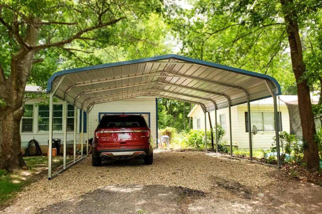 carport addition to garage in driveway