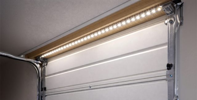 LED strip lighting installed above a garage door for improved visibility