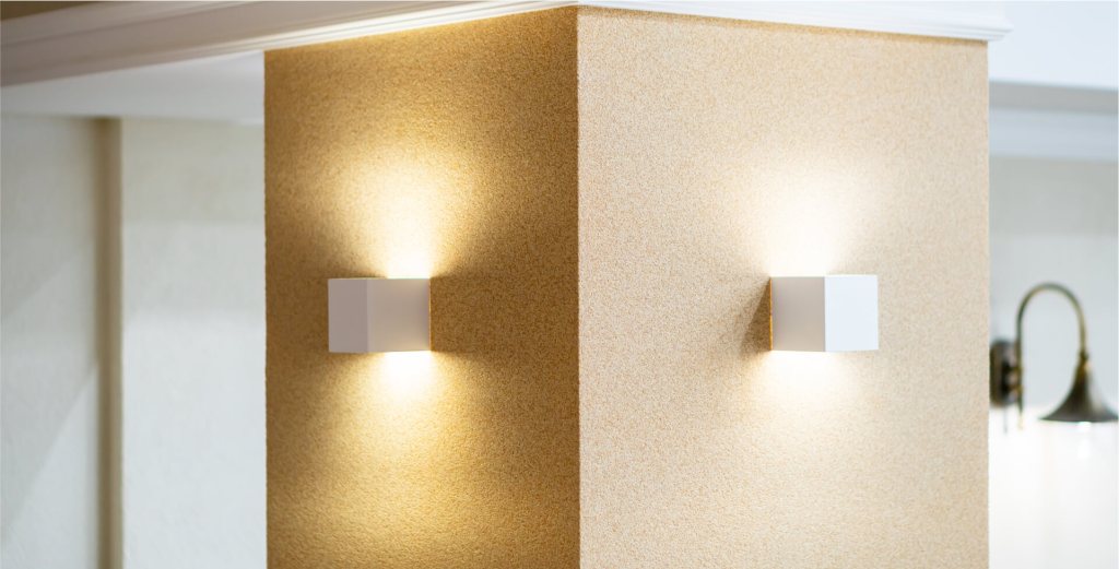 Wall-mounted cube lights illuminating a corner