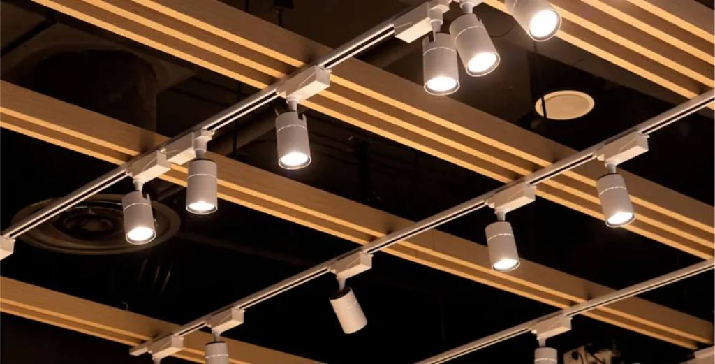 Track lighting system with multiple spotlights