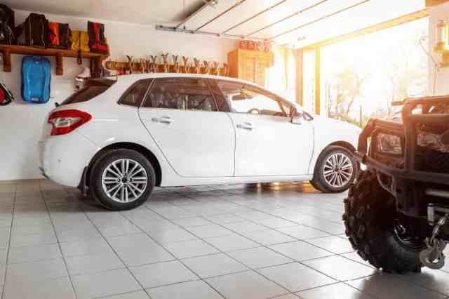 car sitting in an open garage