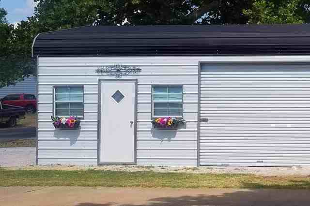 metal shed with outdoor lighting