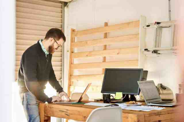 man working in garage home office