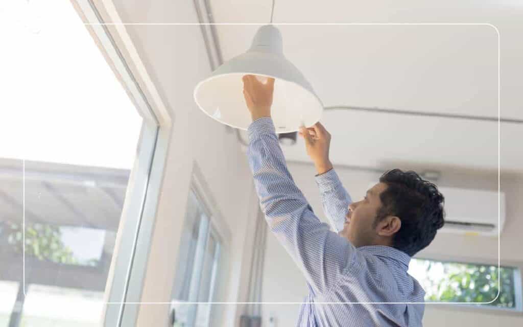 man installing lights