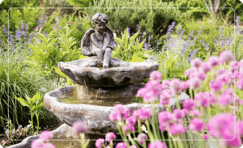 statue water feature in a garden