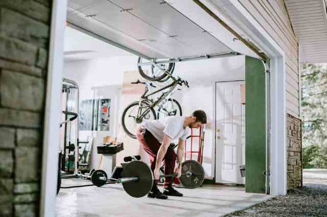 man using garage as a gym