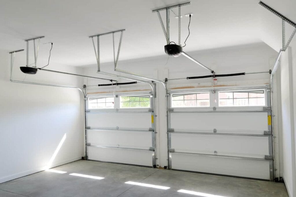 Interior of a garage showing the doors down.