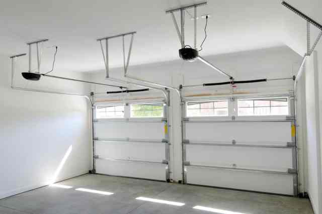 Interior of a garage showing the doors down.