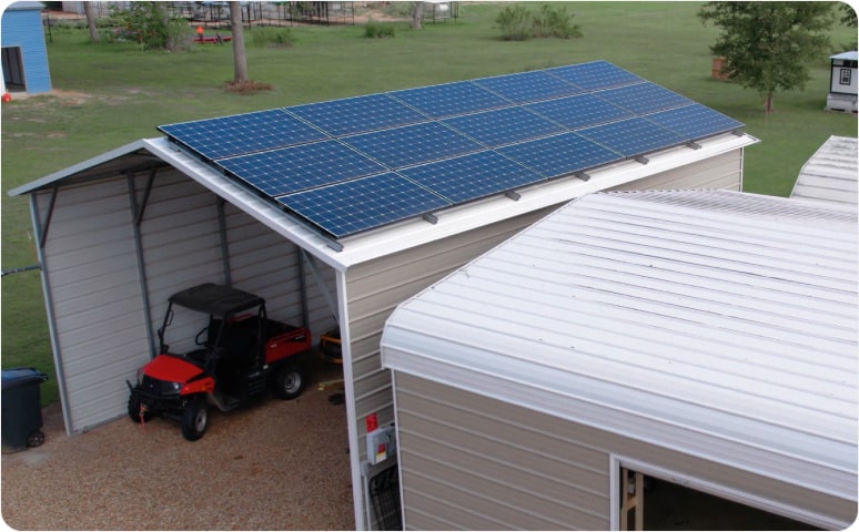 A metal carport with solar panels on the roof