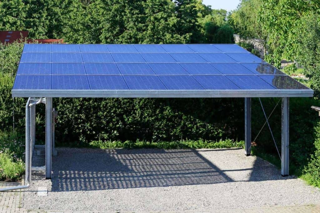 metal carport with solar panels on roof