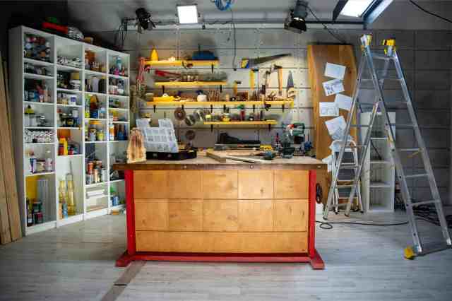 An organized garage with storage shelves.