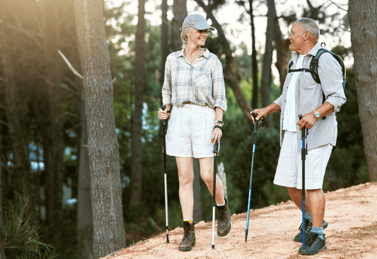 An older couple hiking.