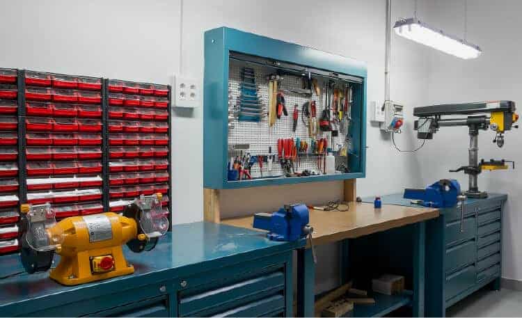 garage makeover with mounted tool organizer