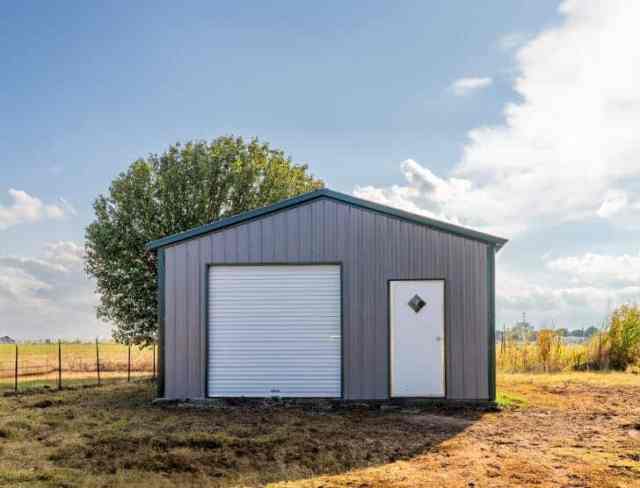 Garage on a grass field.