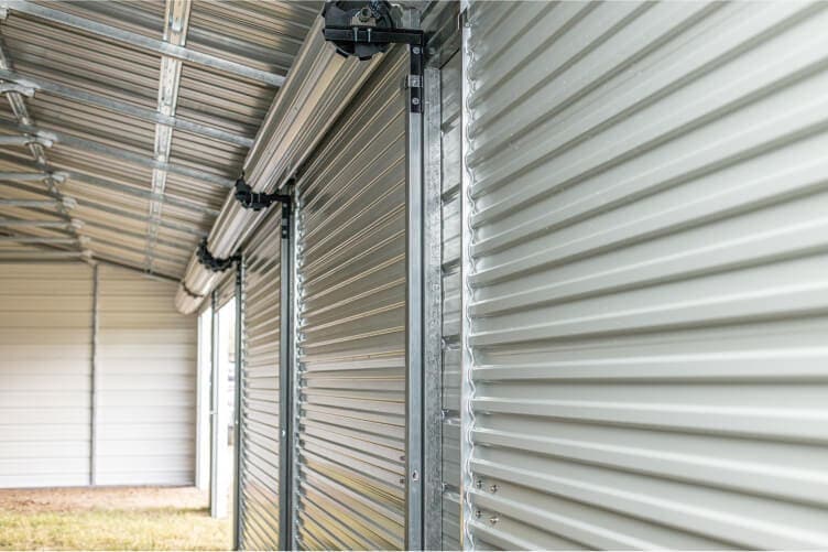 Inside view of 5 roller garage doors.