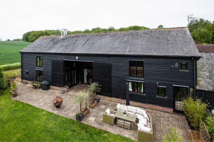 Black modern barndominium 