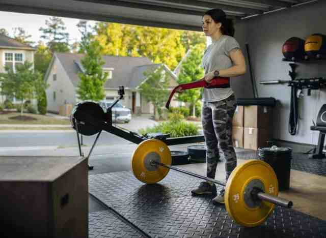 A home gym to encourage homeowners to ask themselves “How Much Does a Garage Remodel Cost?”