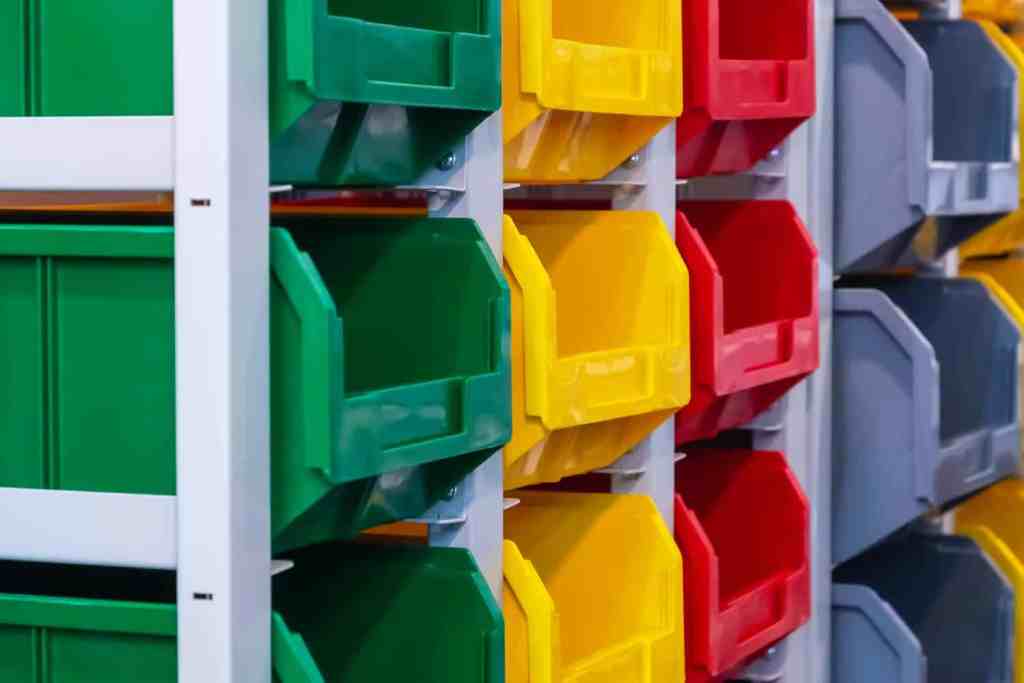 Colorful bins for garage organization.