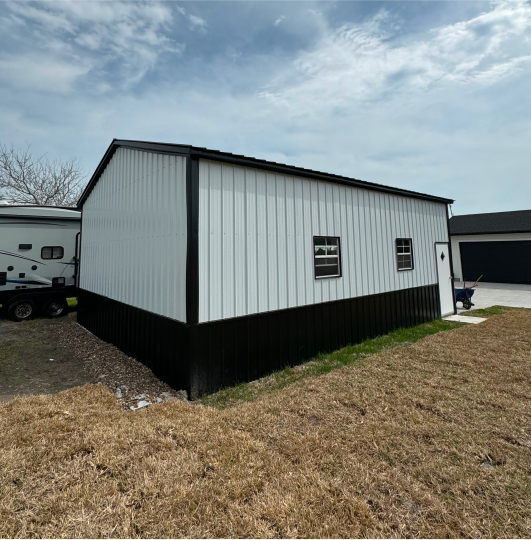 White garage with two visible windows