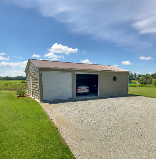 Garage with a car inside of it