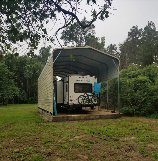 RV Carport surrounded by trees