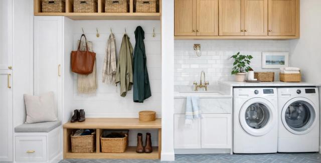 Mudroom and laundry room combination built inside a finished metal garage