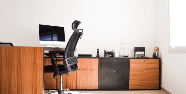 Modern office with a desk and ergonomic chair