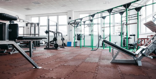 Gym equipped with machines and weights