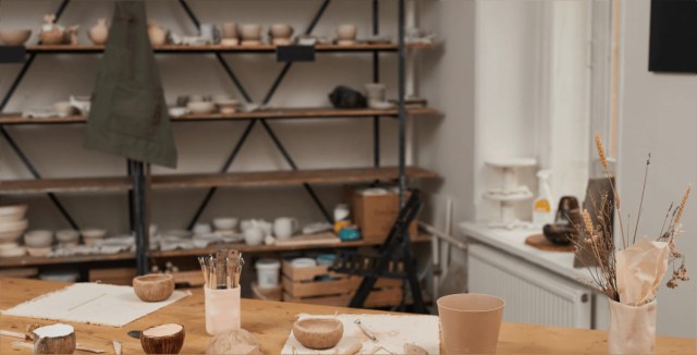 Ceramics workshop with shelves and workpieces