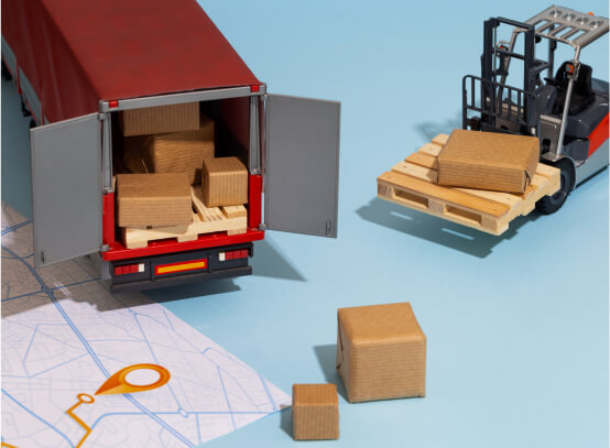 Miniature truck and forklift with small cardboard boxes, depicting a logistics and delivery concept