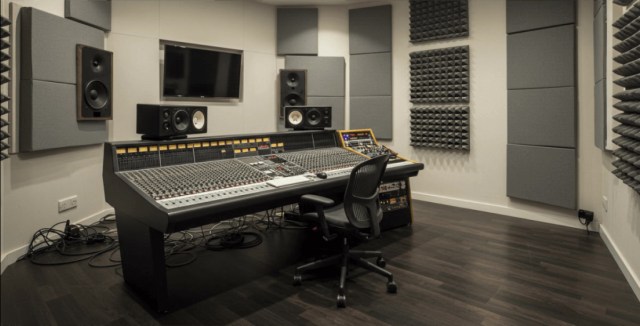 Recording studio with soundproofing and mixing equipment