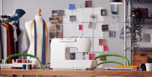 Sewing and fashion design workspace with a sewing machine