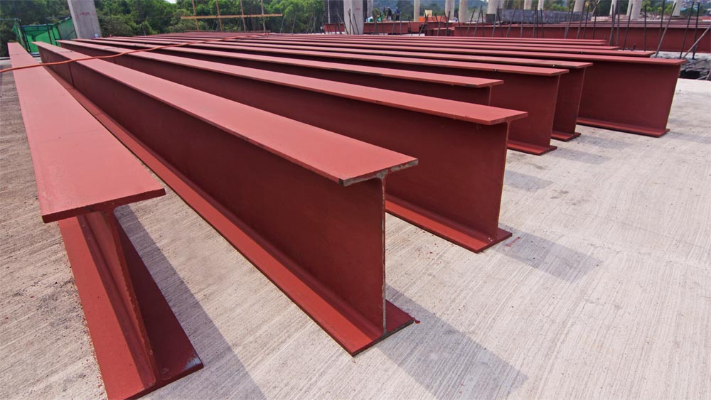 A row of 11 I-beam profiles used for red iron building construction