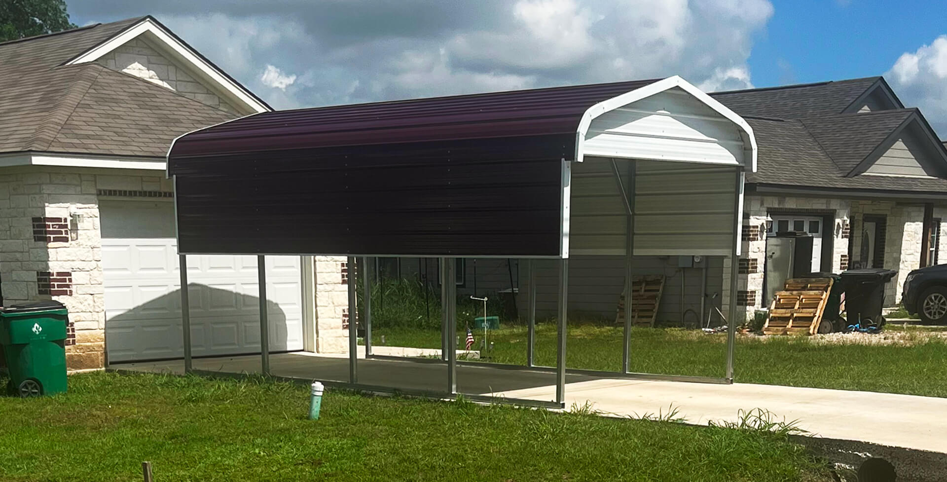RV under metal 12 x 25 carport