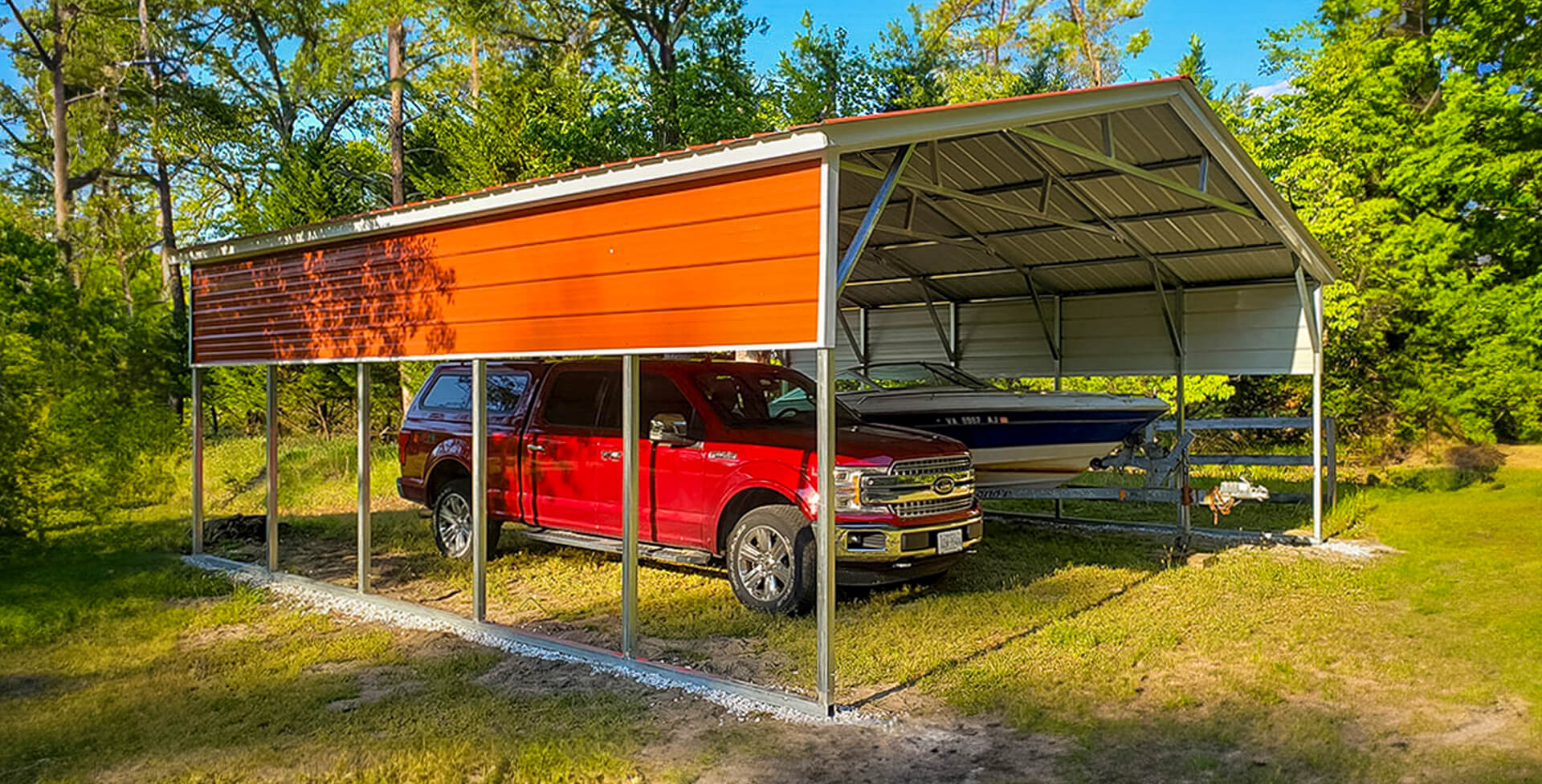 Image of truck and boat under vertical roof carport