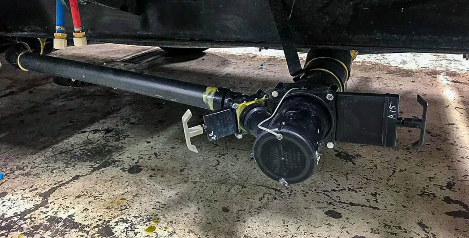 Freshwater, gray water, and black water lines under an RV